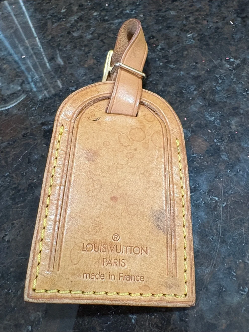 Louis Vuitton luggage tag and strap used condition